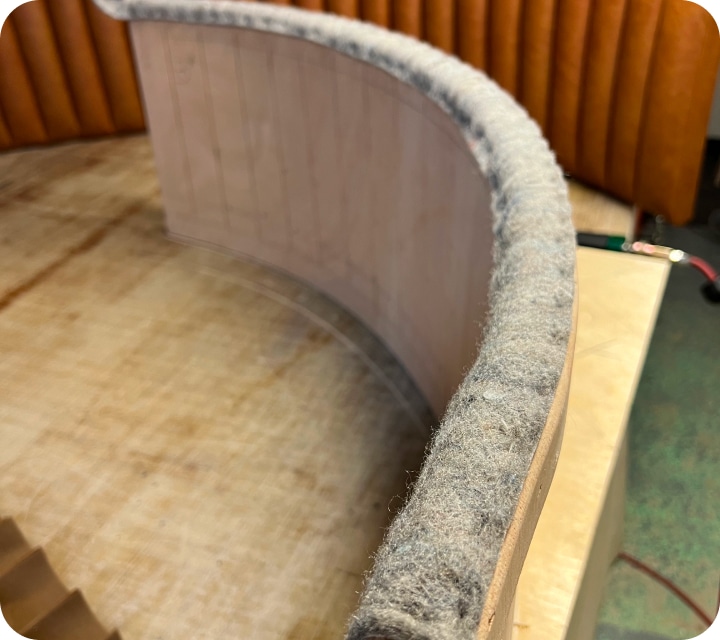 Close-up of the felt padding of a bench seat backrest