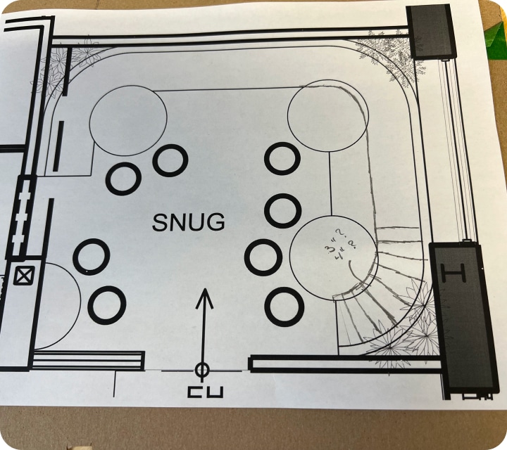Close-up of a space in a future project for a dining room in a bar-restaurant with a bench seating that surrounds 3/4 of the space.
